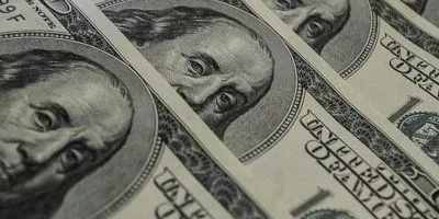 Dólar cai 1,9%, a R$ 5,21, com expectativa por estímulos nos EUA e Fed