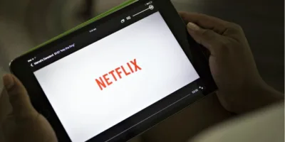 Veja 5 ações que você pode comprar economizando na assinatura do Netflix
