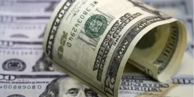 Dólar fecha em queda com arrefecimento da aversão ao risco