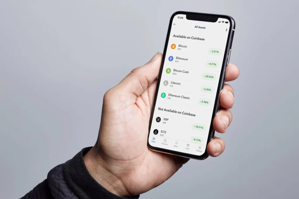 Coinbase abre em alta na Nasdaq de mais de 60%