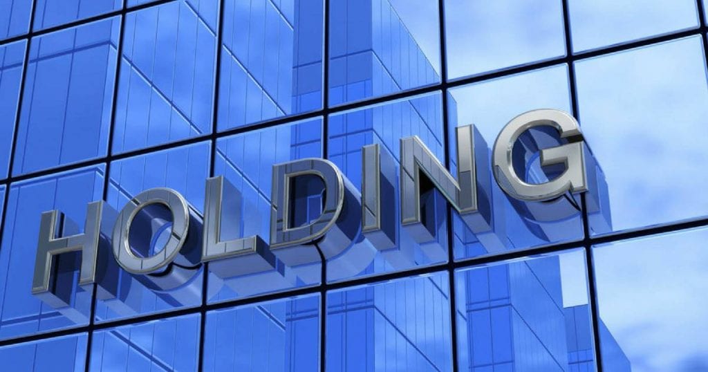 Uma holding controla outras empresas dentro de sua gama de atribuições